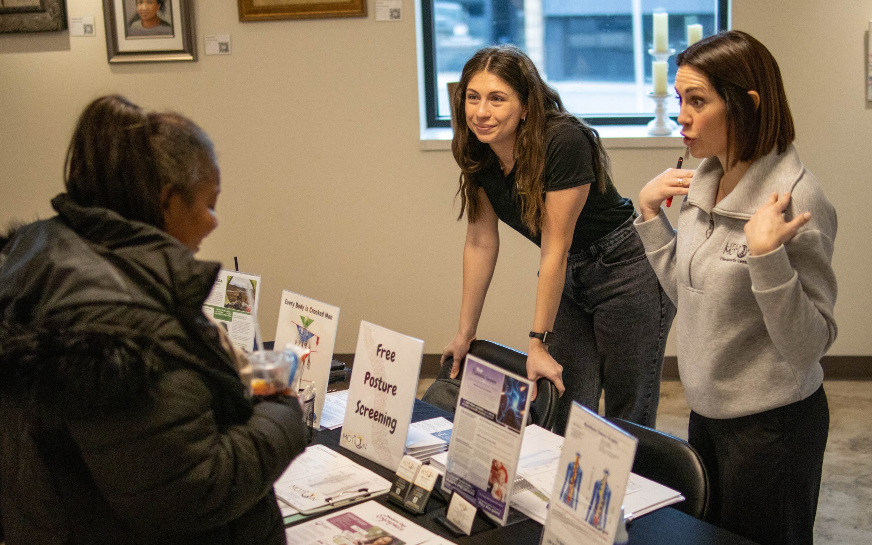 Life in Motion Chiropractic hosting a table at a Resource Fair