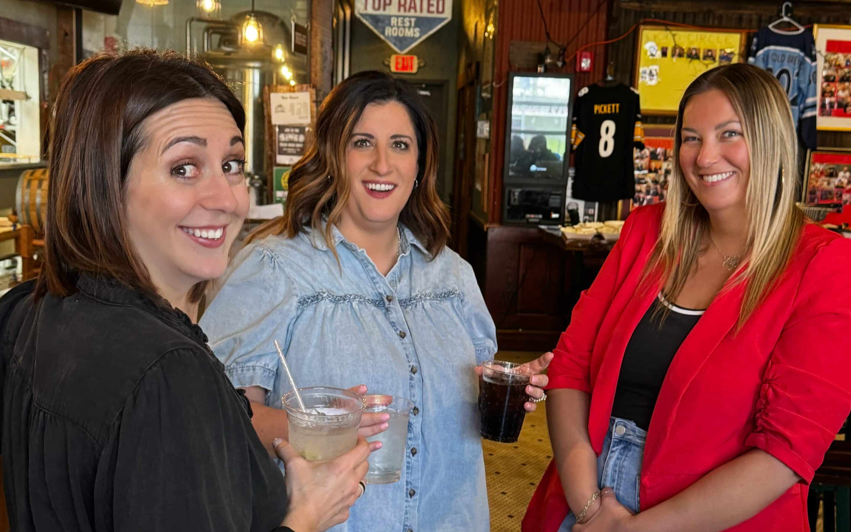 Three chamber members networking at a event