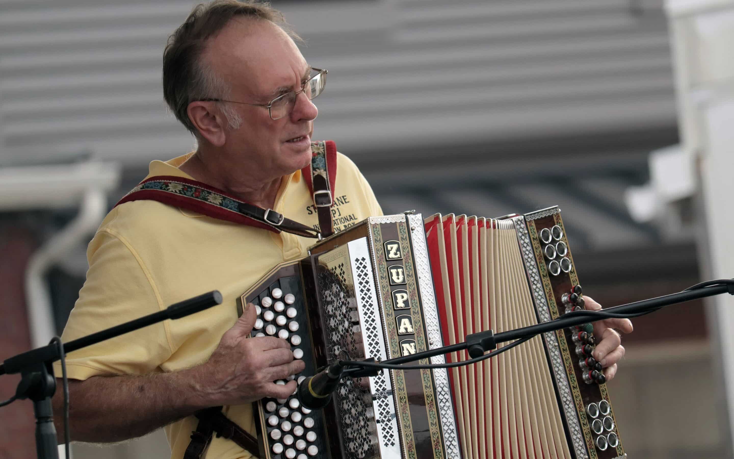 A musician playing a Polka on an accordion
